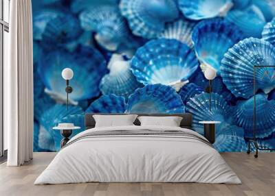 Close up image of solid blue exotic seashells in the ocean Wall mural