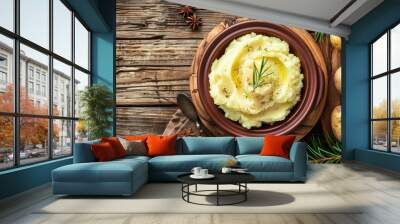 Closeup of bowl of mashed potatoes on wooden surface Wall mural