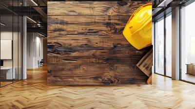 Construction site safety equipment on wooden background with space Wall mural