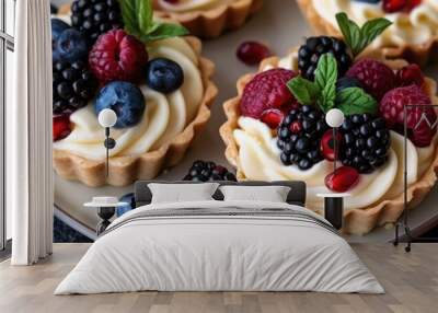 Creamy Fruit and Berry Tartlets with Pomegranate Seeds Wall mural