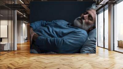 Elderly individual struggling to sleep due to depression. Wall mural