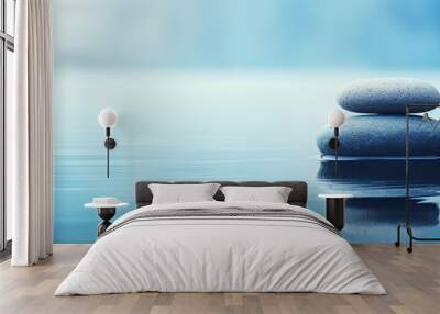 Minimalist composition with Zen like stone water blue color and text space Wall mural