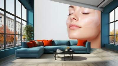 Model enjoying facial treatments. Wall mural