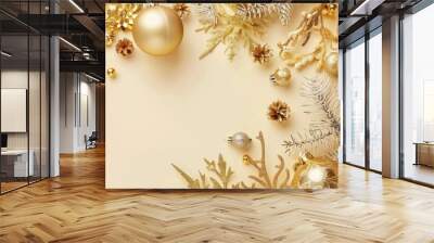 Shiny gold Christmas decor on beige backdrop with space for text Glittery gold holiday arrangement Wall mural