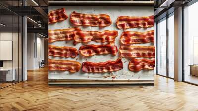 Step by step guide Cooked bacon strips arranged neatly on a baking sheet with white parchment paper Wall mural