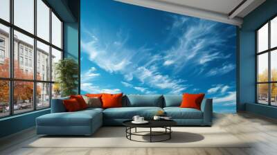 Tranquil panoramic view of beautiful blue sky with fluffy white clouds on a sunny day Wall mural