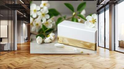 White and gold box on table with flowers space for text Skin care product for wrinkles Wall mural