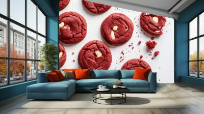 a delightful assortment of freshly baked red velvet cookies, each adorned with crunchy almond pieces. The cookies are arranged on a plain white surface Wall mural