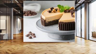 Delicious chocolate caramel cheesecake with rich crust and toppings Wall mural