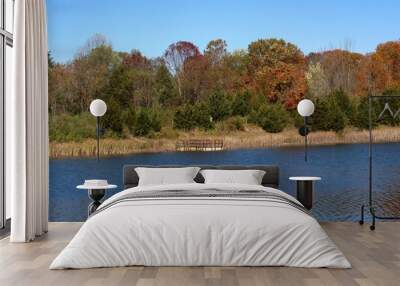 The calm peaceful view of the lake on a sunny fall day. Wall mural