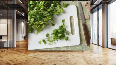 parsley leaves on cutting board - bright green - closeup Wall mural