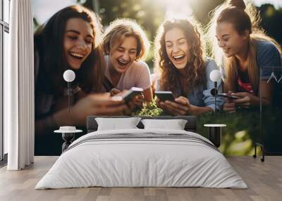 Group of Young Women Laying on Lush Green Field Wall mural