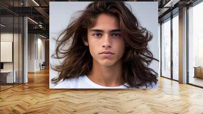 Happy cheerful young latino generation z. Smiling funny ethnic cool generation z teenage student, long hair, white background. Wall mural