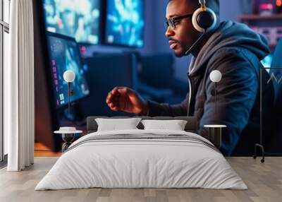 African american male gamer playing pc video game in a gameroom gameroom  Wall mural