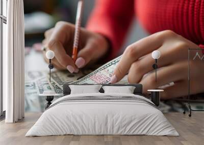 Lottery and money in woman's hands. Wall mural