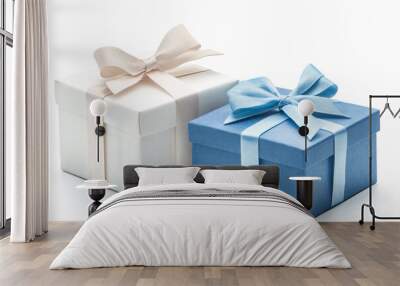 two gift boxes in white and blue tied with a bow on a white isolated background Wall mural