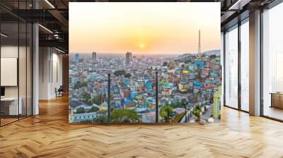 Panoramic photo of the view of Guayaquil from the top of the lighthouse on the Cerro Santa Ana (Saint Ana hill), a moment before sunset after a warm sunny summer day. Ecuador. Wall mural