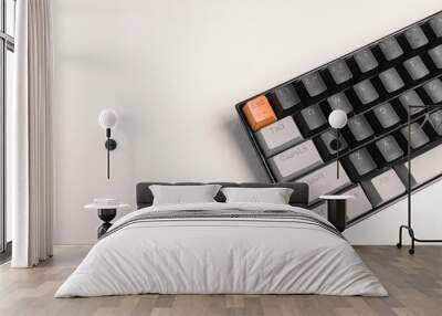 mechanical keyboard with black gray and orange keycaps on a minimalist white background Wall mural