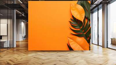 Tropical leaves on orange background is a vibrant and colorful design asset suitable for tropical themed projects, summer illustrations, and nature-inspired graphic designs Wall mural