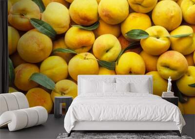 Group of yellow peaches with leaves Wall mural