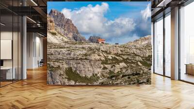 Alpine Mountain Hut in Sesto or Sexteen Dolomites called Rifugio Antonio Locatelli in front of Tre Cime di Lavaredo. Mountain range of Tre Scarperi. Bolzano, Dobbiaco, Trentino-Alto Adige, Italy. Wall mural