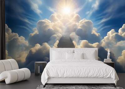 Stairway to Heaven. A long empty staircase among beautiful cumulus clouds against a blue sky with sunbeams. Wall mural