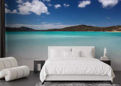 Relaxing clear water beach with mountains in the background 2 Wall mural