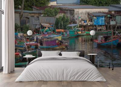 Phu Quoc island Vietnam, December 2017 Boats are mooring next to fishermen houses Wall mural