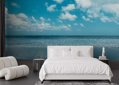 Sea, beach and clouds Wall mural