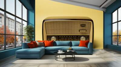 old radio isolated on yellow Wall mural