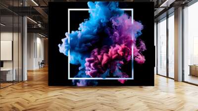 Black background, a pink and blue smoke cloud inside a white square frame, a smoke explosion, colored liquid ink in water on a black isolated background with copy space. Abstract colorful paint Wall mural