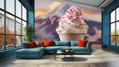 cup of ice cream with chocolate sprinkles on top in front of the breathtaking scene of Mount Fuji in Japan. The blue sky and white clouds create an enchanting backdrop for this delightful dessert  Wall mural