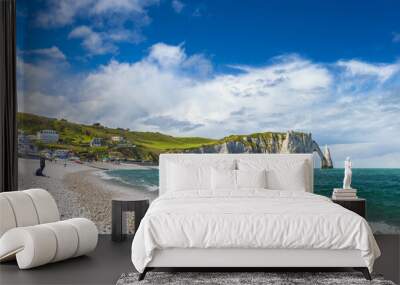 Panoramic view of the beach of Etretat in Normandy, a popular french seaside town known for its chalk cliffs Wall mural