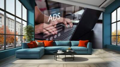 Digital marketing commerce online sale concept, Businessman use laptop with advertising on website. planning advertising marketing strategies to target social media native, ad, advertisers, sales. Wall mural