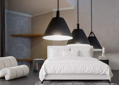 Close-up of black lamps on ceiling. Modern interior. Wall mural