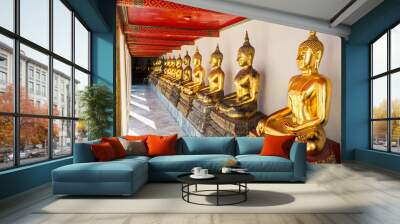  Row of golden buddha statues at Wat Pho temples in Bangkok , Thailand. Wall mural