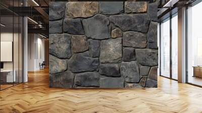 Textured stone wall featuring various sizes and shapes of dark and light stones arranged in a natural pattern. Wall mural