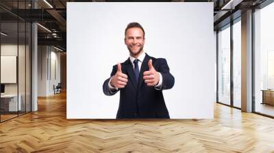 businessman showing thumbs up gesture Wall mural