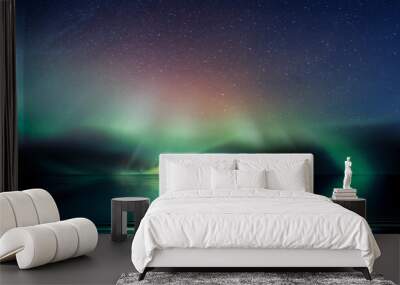 green blue Aurora Borealis on starry sky northern sea wave reflection nature nebula cosmic starry background Wall mural