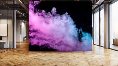 Translucent, thick smoke, illuminated by light against a dark background, divided into three colors: blue, green and purple, burns out, evaporating from a steam of vape. Wall mural