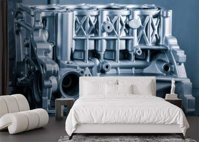 Close-up of the cylinder block in the light blue. Automotive part, machine part Wall mural