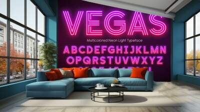 Neon light alphabet, multicolored extra glowing font Wall mural