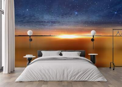 Night starry sky blue gold sunset reflection on sea water wave and gold sunset banner background template Wall mural