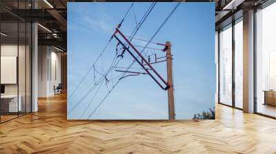 Railway wires. Transport electricity. Poles with wires. Electric transport. Electric trains and trains Wall mural