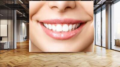 Beautiful female smile after teeth whitening procedure. Dental care. Dentistry concept Wall mural