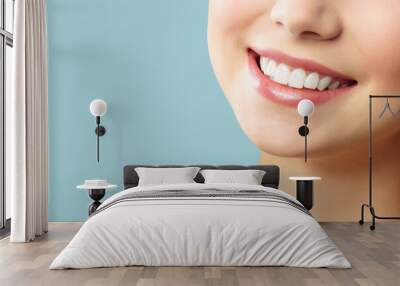 Perfect healthy teeth smile of a young woman. Teeth whitening. Stomatology concept. Wall mural