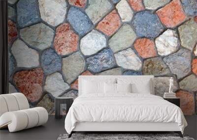 wall made of natural multi-colored stone of irregular shape connected by cement Wall mural