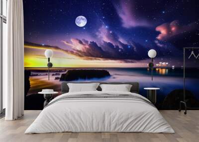 sunset at  night at sea starry sky and moon on dramatic clouds sea water wave and stones on horizon blurred city light Wall mural