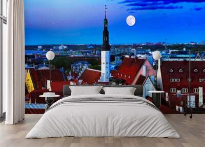 Tallinn old town   panorama on summer night full moon on blue skyline   medieval red roofs towers at evening travel to Estonia  Wall mural