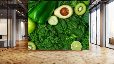 Selection of healthy green food fresh vegetables and fruit. Concept of green color, clean eating, vegetarian and vegan food and cuisine, lifestyle, diet, and fitness Wall mural